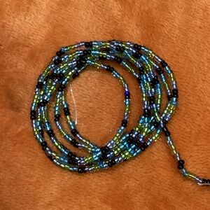 Nice and durable , acrylic waist bead . Fits waist size up to 38inches